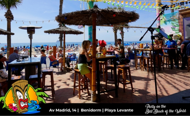 Tiki Beach's bar and tables near the beach