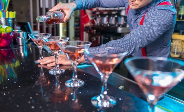 a bartender making cocktails