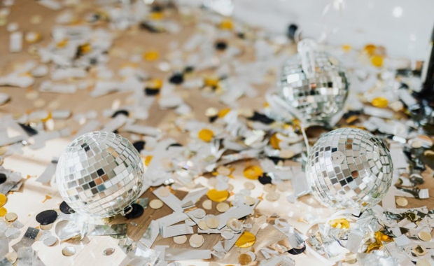 confetti and mini disco balls spilled on the floor