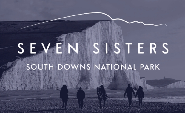 the banner for the seven sisters cliffs