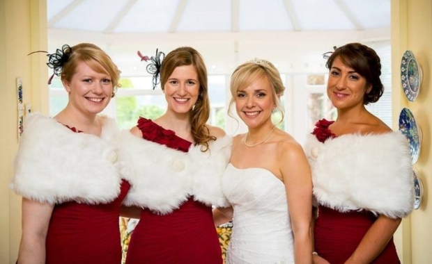 Bride and bridesmaids posing for a photo. Make up by Jen Hunter 