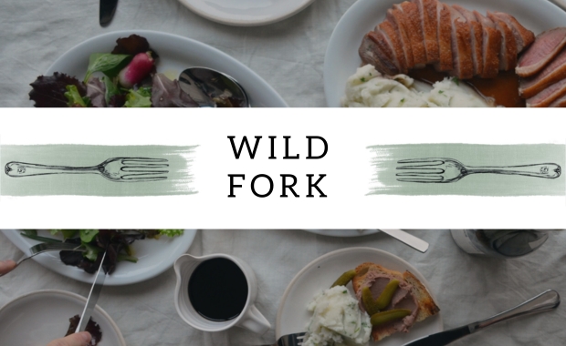 a table setup with wild fork's logo 